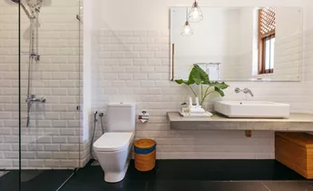 Clean white bathroom showing good washroom hygiene